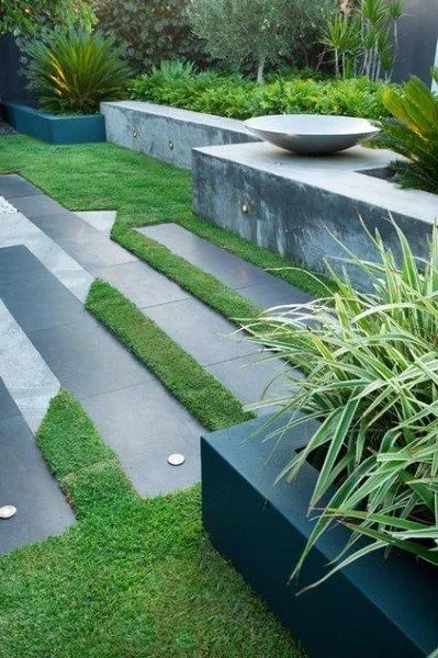 Stone pathway guiding a walk through garden planting