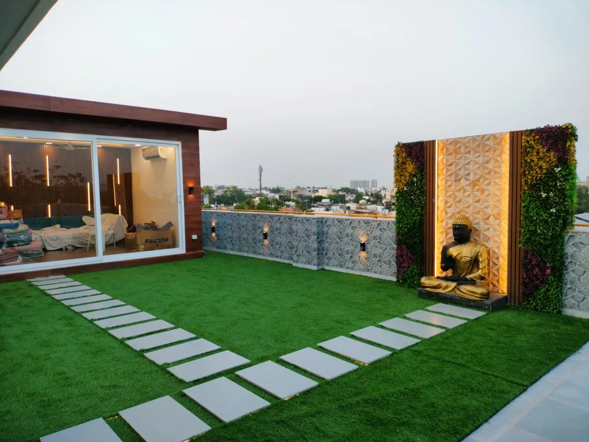 Rooftop garden with lawn, cabin and stepping stones
